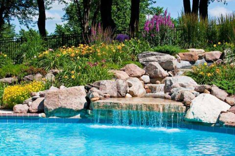 The beautiful poolside of a waterfall with rocks